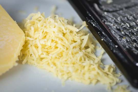 rubbing of yellow cheese
