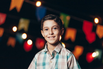 Brazilian boy wearing typical clothes for the Festa Junina - June festival