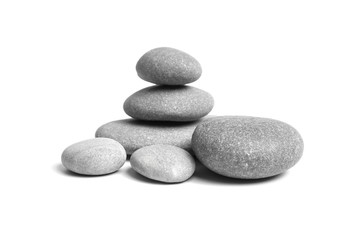 Fototapeta na wymiar Stacked smooth grey stones. Sea pebble. Balancing pebbles isolated on white background