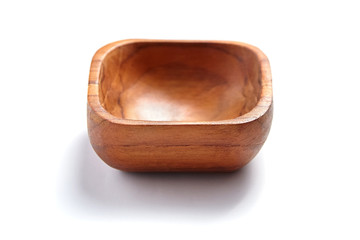 Empty wooden bowl isolated on white background. Quadrate salad-bowl
