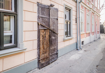 Closed old iron door of the building