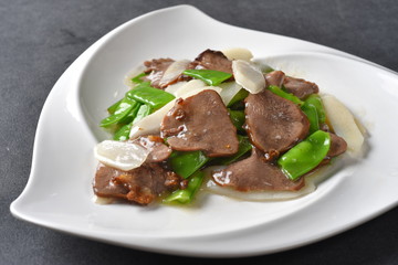 grilled beef steak with sauce and vegetables