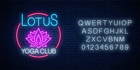 Neon glowing sign of lotus yoga club in circle frame with alphabet. Street lights signboard of chinese gymnastics.