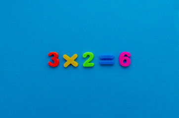 math action on blue paper background