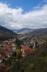 Fototapeta na wymiar Top view of the old town, located in a valley between the mountains. France. Alsace. Vosges. City Kaysersberg. Landscape.