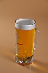 glass of beer on wooden table