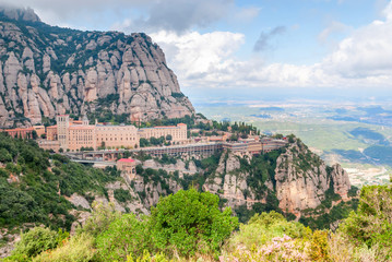 Fototapeta na wymiar Santa Maria de Montserrat Abbey in Monistrol de Montserrat, Catalonia, Spain.