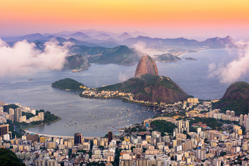 The mountain Sugarloaf and Botafogo in Rio de Janeiro at sunset, Brazil - obrazy, fototapety, plakaty