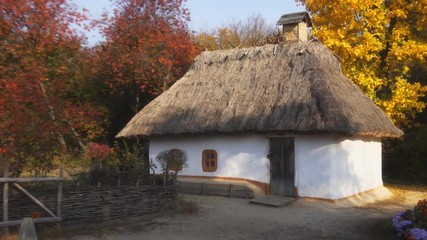 Traditional Rural Home with Thatched Roof in Ukraine
