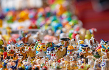 Fototapeta premium various owl figures to choose from on the counter