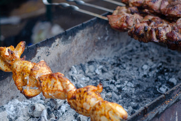 fried pieces of meat planted on skewers