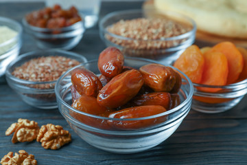 Healthy food composition on wooden background, closeup