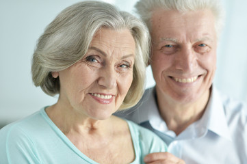 Close up portrait of happy senior couple