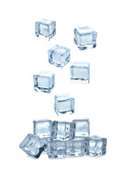 Set of flying crystal clear ice cubes on white background