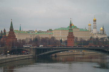 Fototapeta premium Moscow cityscape. Image of historical Moscow Kremlin in the spring day. Kremlin Towers, Residence of the President of the Russian Federation, Ivan the Great Bell Tower and Bolshoy Kamenny Bridge over