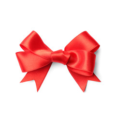 Red ribbon with bow on white background. Festive decoration