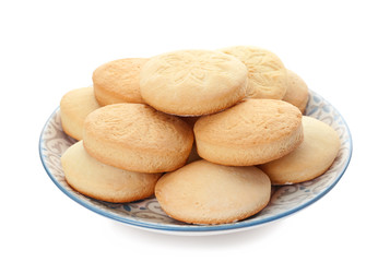 Plate with cookies for Islamic holidays isolated on white. Eid Mubarak