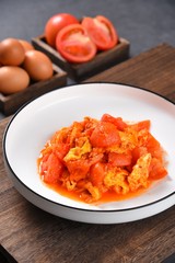 fried eggs with tomatoes
