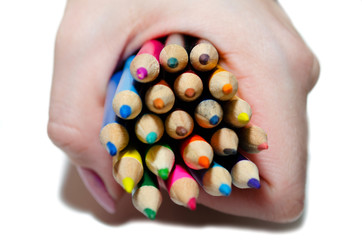 Close up color pencils isolated on white background.