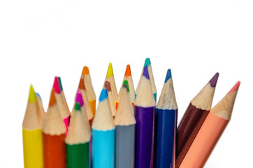 Close up color pencils isolated on white background.