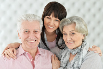 Portrait of happy family posing at home