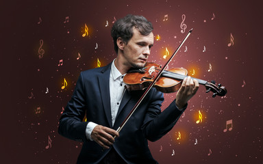 Young violinist with falling musical notes wallpaper and classical concept