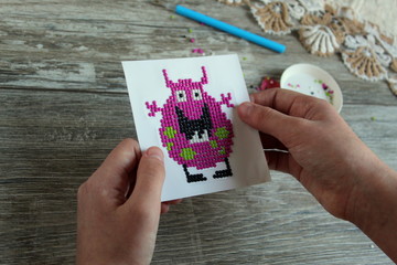 The picture of the diamond mosaic funny monsters, needlework.