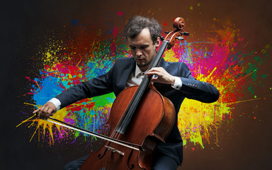 Young classical musician with colorful splotch wallpaper
