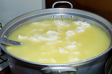 Traditional process of making of cheese in Albania Selective focus