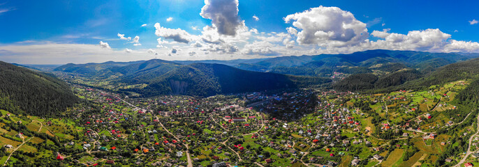 mountain hills and forest on the background of blue sky in the Carpathians, Ukraine