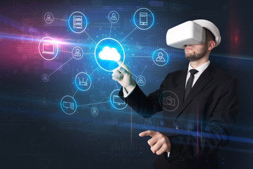 Businessman in vr glasses organize lifesize projected social media concept
