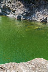 Green water under Ponte Romano Intragna Bridge