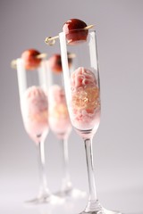 two glasses of champagne and strawberries