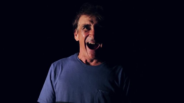 Man impressed by what he hears. Discredited. Scared with so much good news.