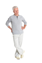 Fototapeta premium Portrait of senior man posing on white background, full length