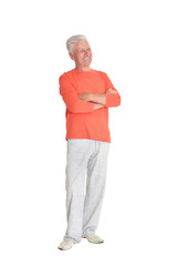 Full length portrait of happy senior man in shirt on white