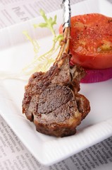 grilled steak with sauce and vegetables