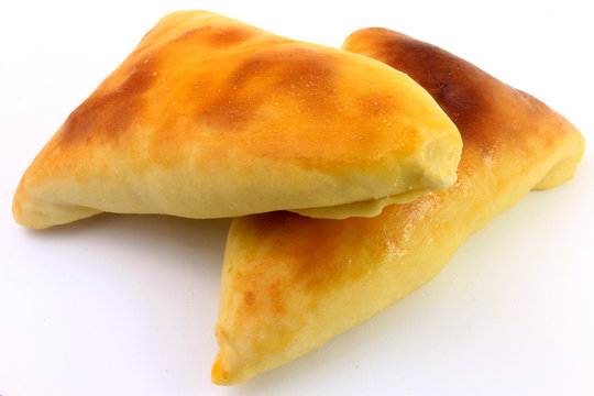 meat sfiha (esfiha) of arabic origin traditionally adapted for brazilian cuisine on white background