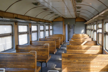 Salon electric train with wooden seats in retro style