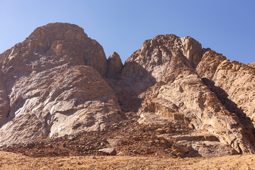 Fototapeta premium Egypt. Mount Sinai in the morning at sunrise. (Mount Horeb, Gabal Musa, Moses Mount). Pilgrimage place and famous touristic destination.