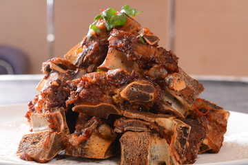 grilled pork ribs on white plate