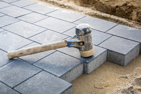 Concrete paver blocks laid with rubber hammer