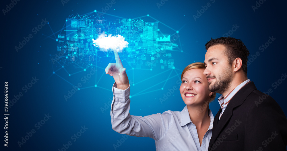 Aufkleber Man and woman touching hologram projection displaying information from cloud based system
