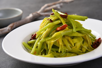 pasta with pesto sauce and basil