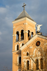 Fototapeta premium Sunset view of The Roman Catholic church of St Michael the Archangel in town of Rakovski, Bulgaria