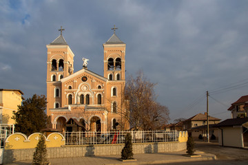 Fototapeta na wymiar Sunset view of The Roman Catholic church of St Michael the Archangel in town of Rakovski, Bulgaria