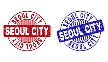 Grunge SEOUL CITY round stamp seals isolated on a white background. Round seals with grunge texture in red and blue colors. Vector rubber imprint of SEOUL CITY text inside circle form with stripes.