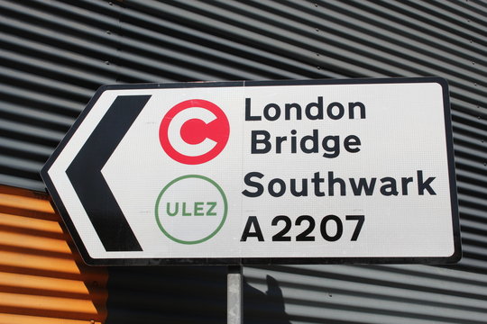 ULEZ London, UK - April 9 2019: ULEZ (Ultra low emission zone) London prepare for new Ultra Low Emission Zone (ULEZ) with warning signage in central London. £12.50  - 15 minute city