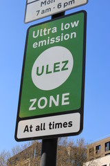 ULEZ, London, UK - April 8 2019: ULEZ (Ultra low emission zone) charge congestion charge & Ultra Low Emission Zone (ULEZ) warning sign central London £12.50, TFL stock photo photograph image picture