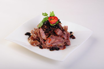 grilled meat with vegetables on white plate
